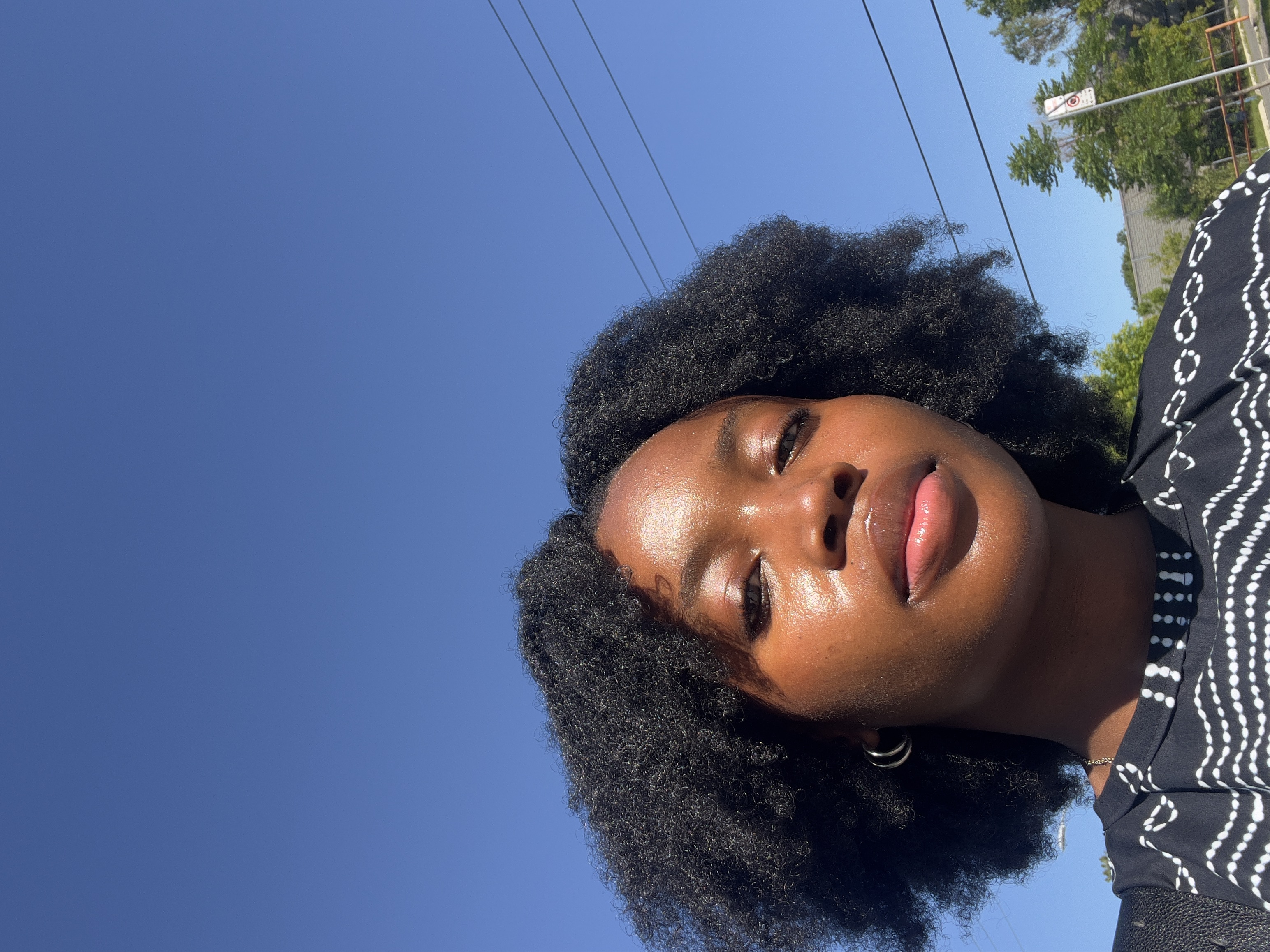 Ade Adejuwon, product designer, outdoors in Toronto